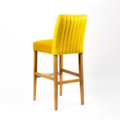 Fritz line Tabouret de bar avec dos en tissu matelassé et pieds en bois