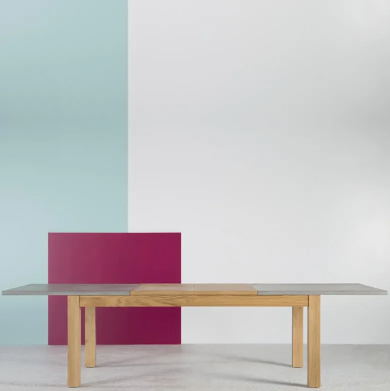 Repas Table française extensible en béton ciré et bois massif